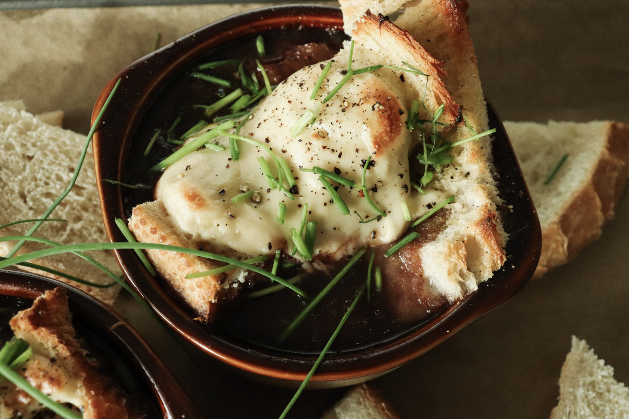 Gruyere cheese on top of French onion soup