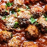 Hero image of dutch oven meatballs close up.