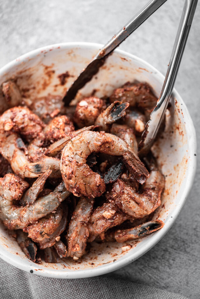 How to make blackened shrimp in a pan process shot. 