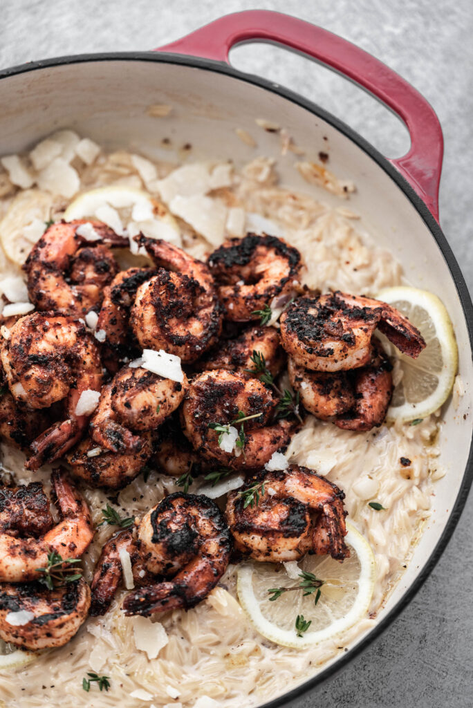 Process shot for making blackened shrimp alfredo. 