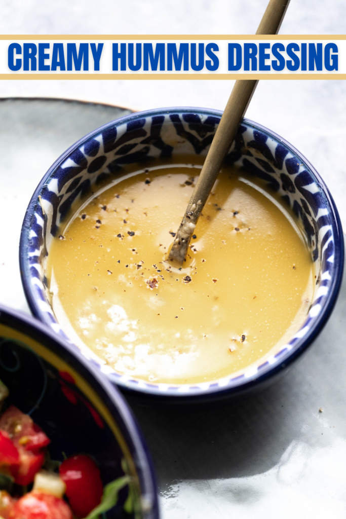Creamy Hummus Dressing Recipe Pinterest Pin--close up of the hummus dressing hero shot.