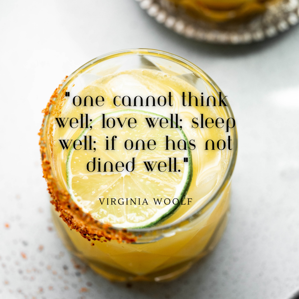 Dinner captions for instagram: photo of a drink with a Virginia Woolf quote about eating and drinking. 