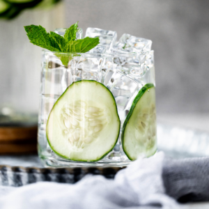 cucumber mint water in a short glass