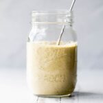 Chick-Fil-A Creamy Salsa Dressing in a mason jar with a gold spoon.