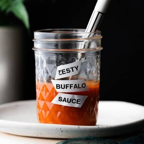 chick-fil-a copycat zesty buffalo sauce in a labeled mason jar.