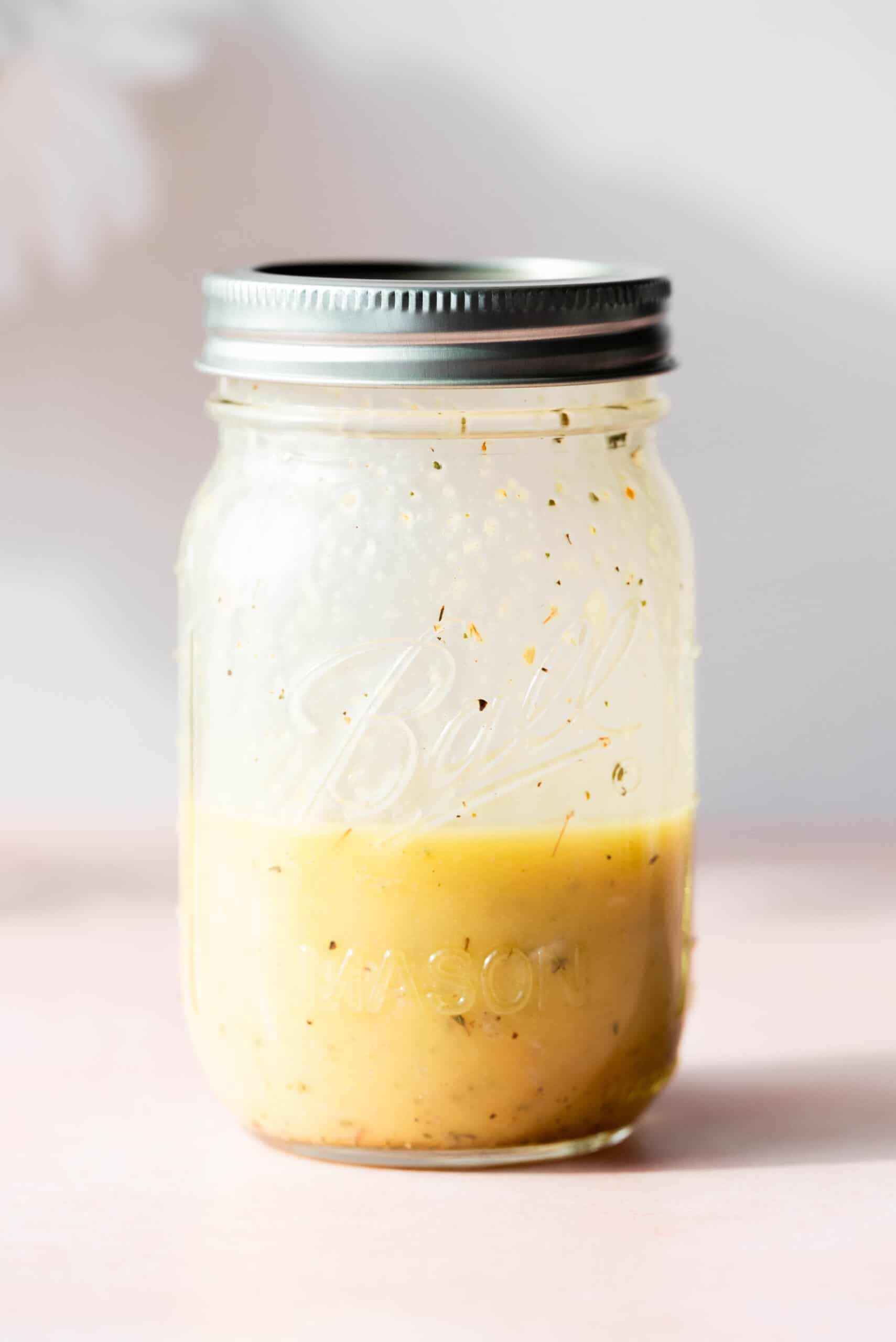 Jar with sherry shallot dressing. 