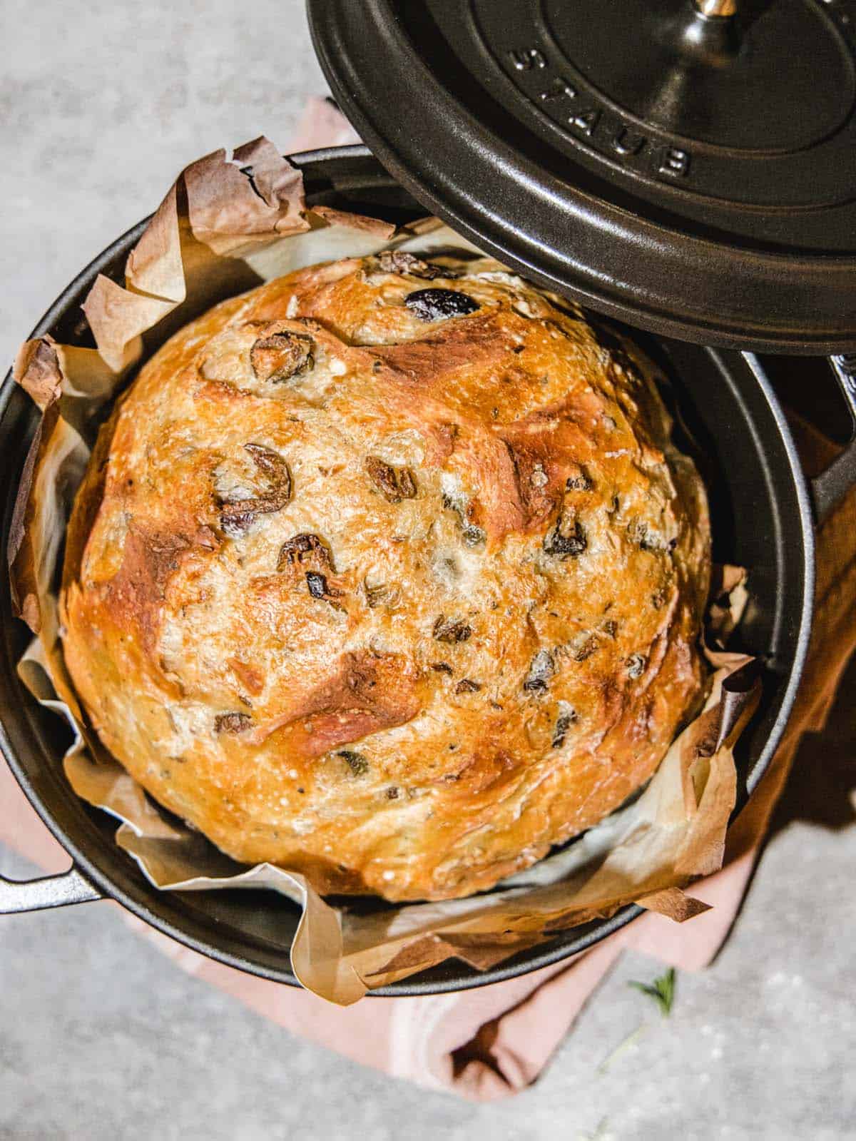 Overhead image of bread in a dutch oven. 