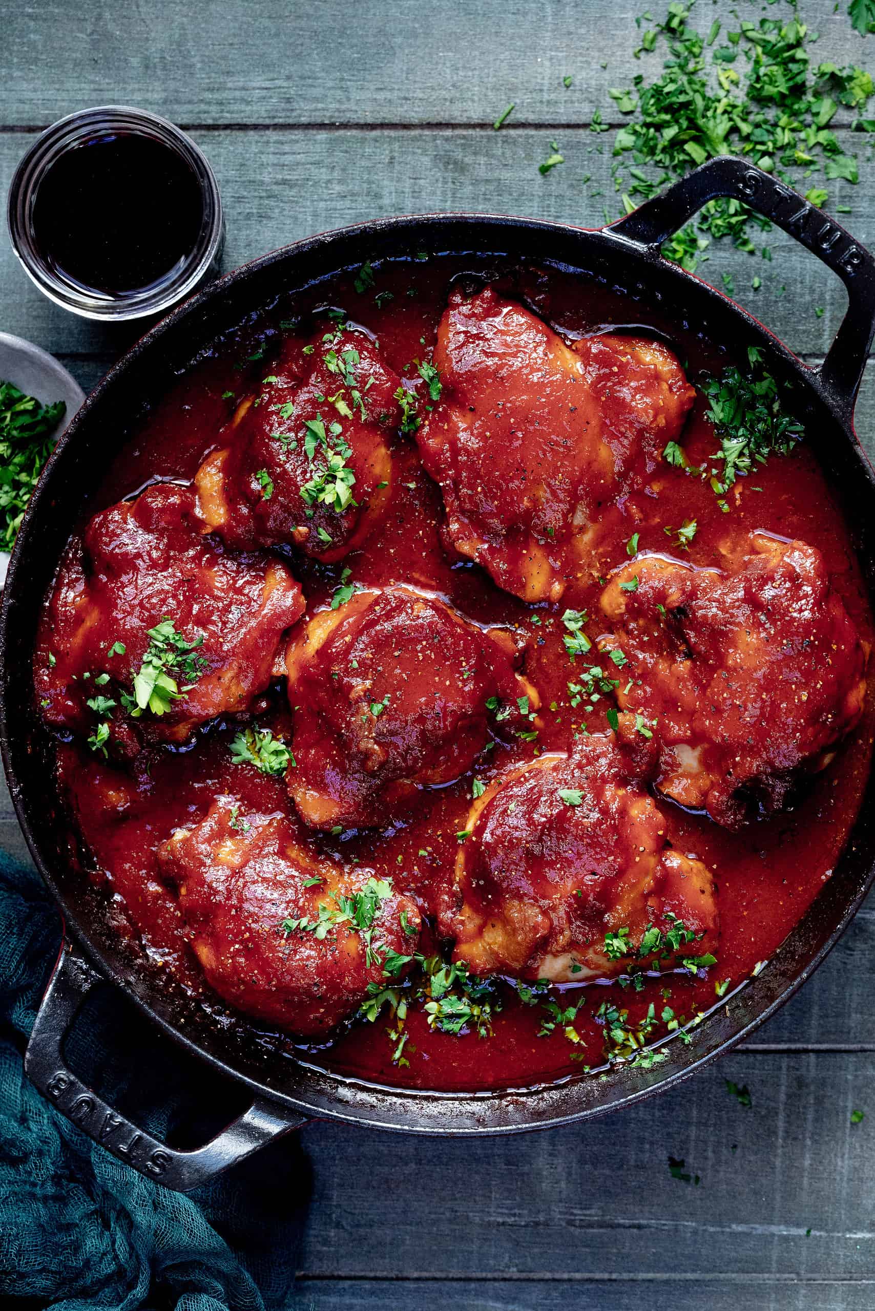 Overhead image of chicken thighs in a dutch oven. 