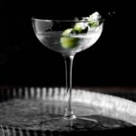 Martini mocktail with olives.