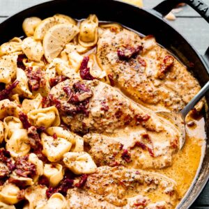 Chicken and tortellini in a dutch oven.