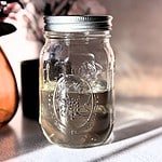 Simple syrup for mocktails in a mason jar.