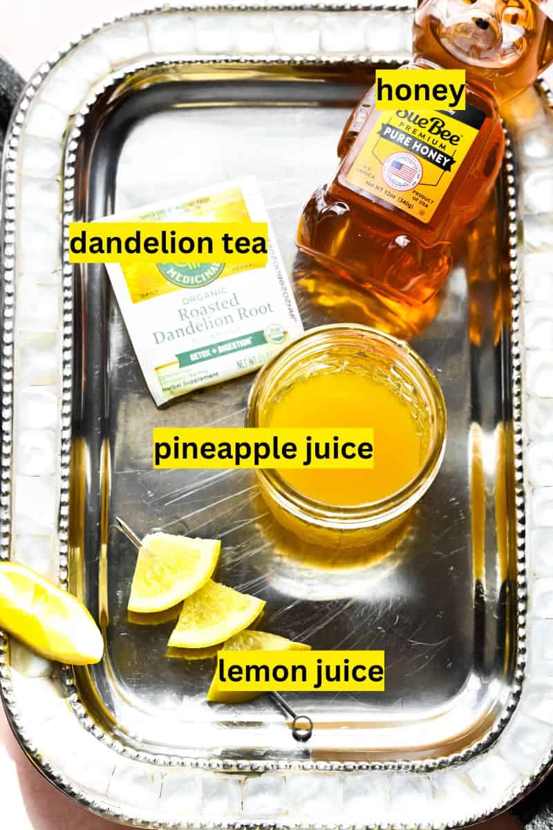 Ingredients needed to make the detox mocktail on a silver plate. 