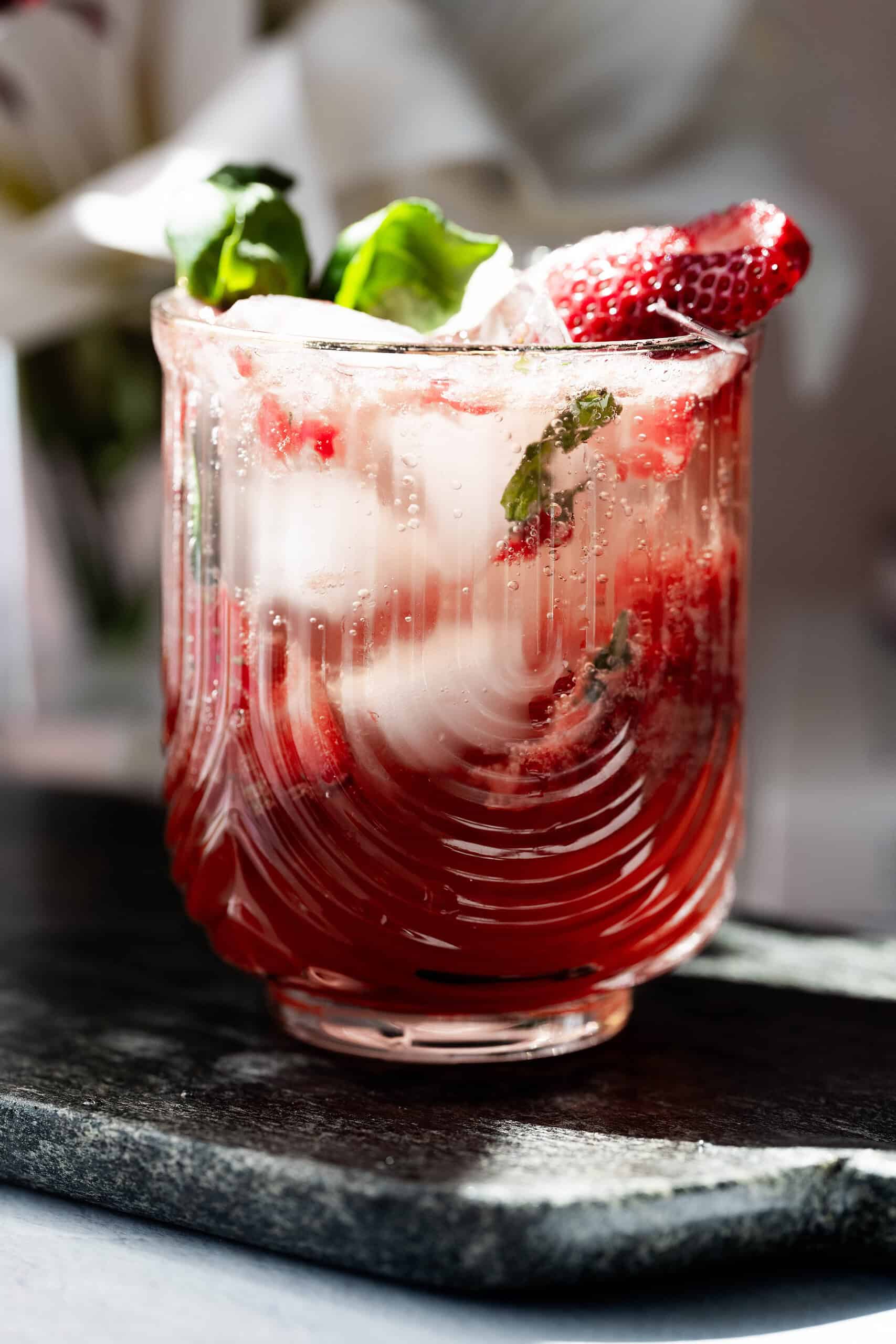 Strawberry Basil Balsamic Mocktail hero image with bubbles. 