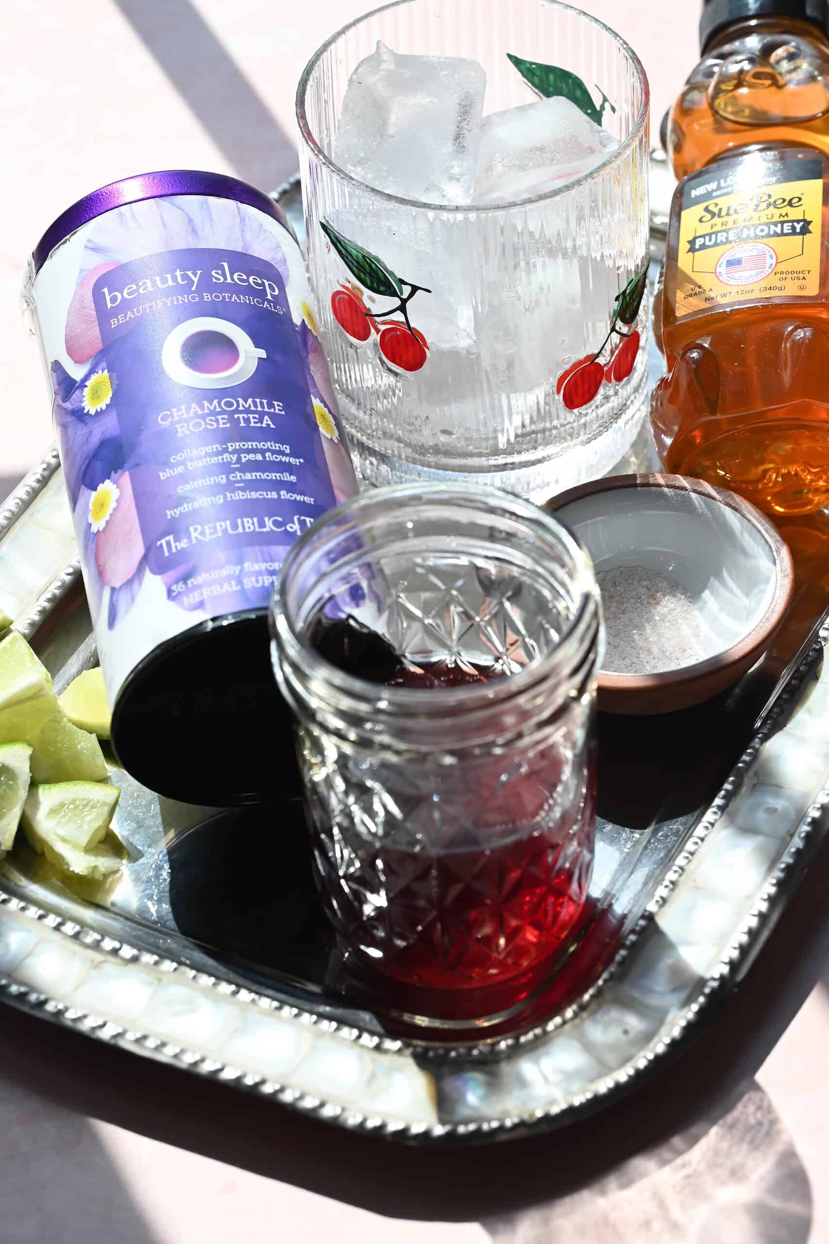 Ingredients needed to make a cherry sleepy mocktail. 