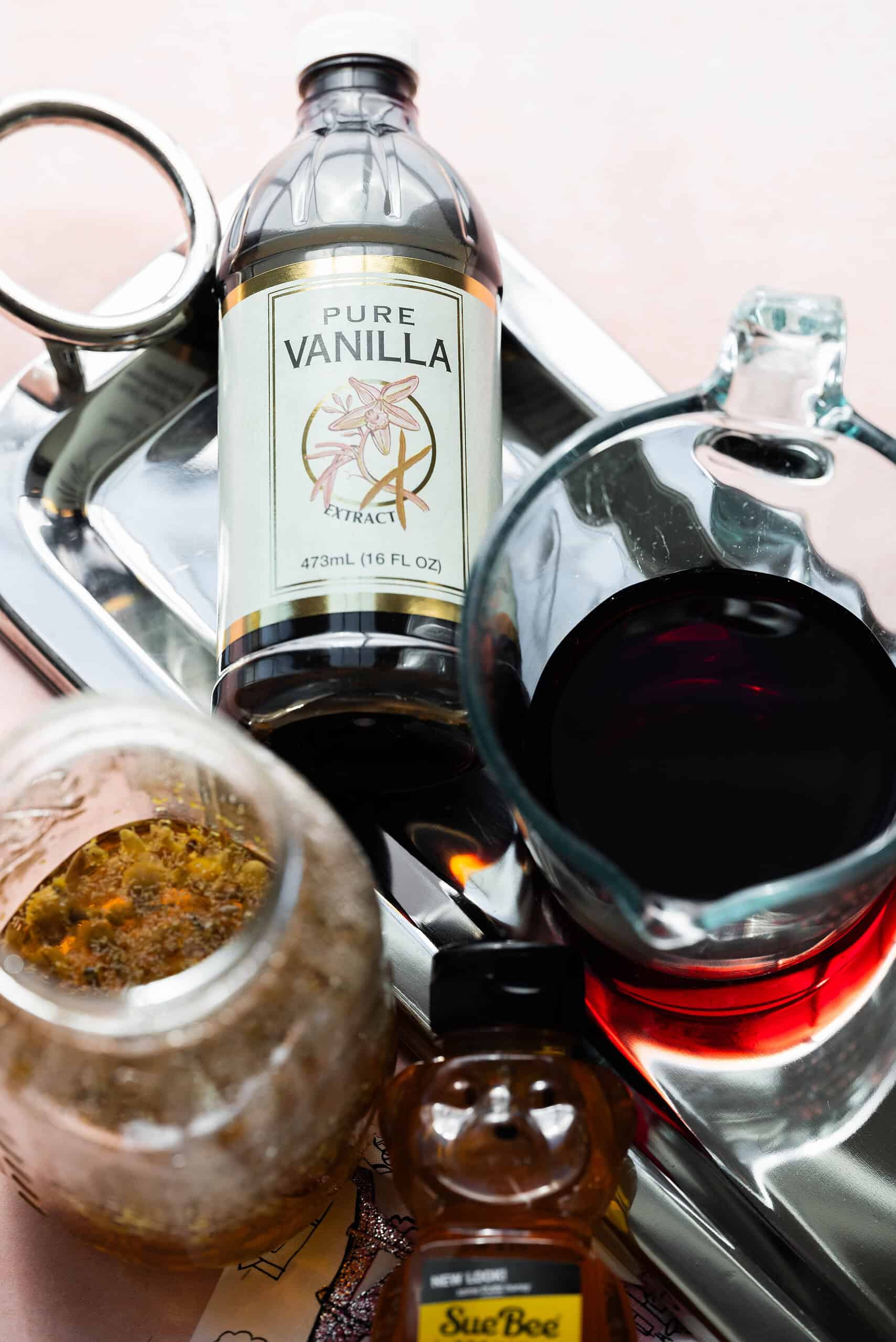 Ingredients needed to make a vanilla and blueberry mocktail. 