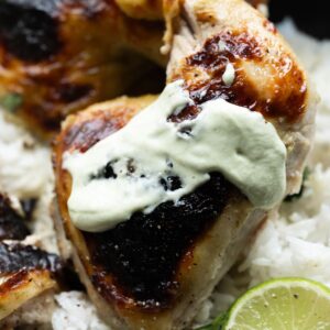 Hero image of marinated chicken with some yogurt sauce