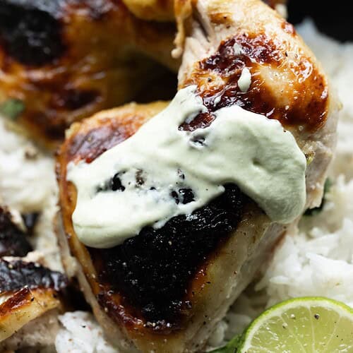 Hero image of marinated chicken with some yogurt sauce