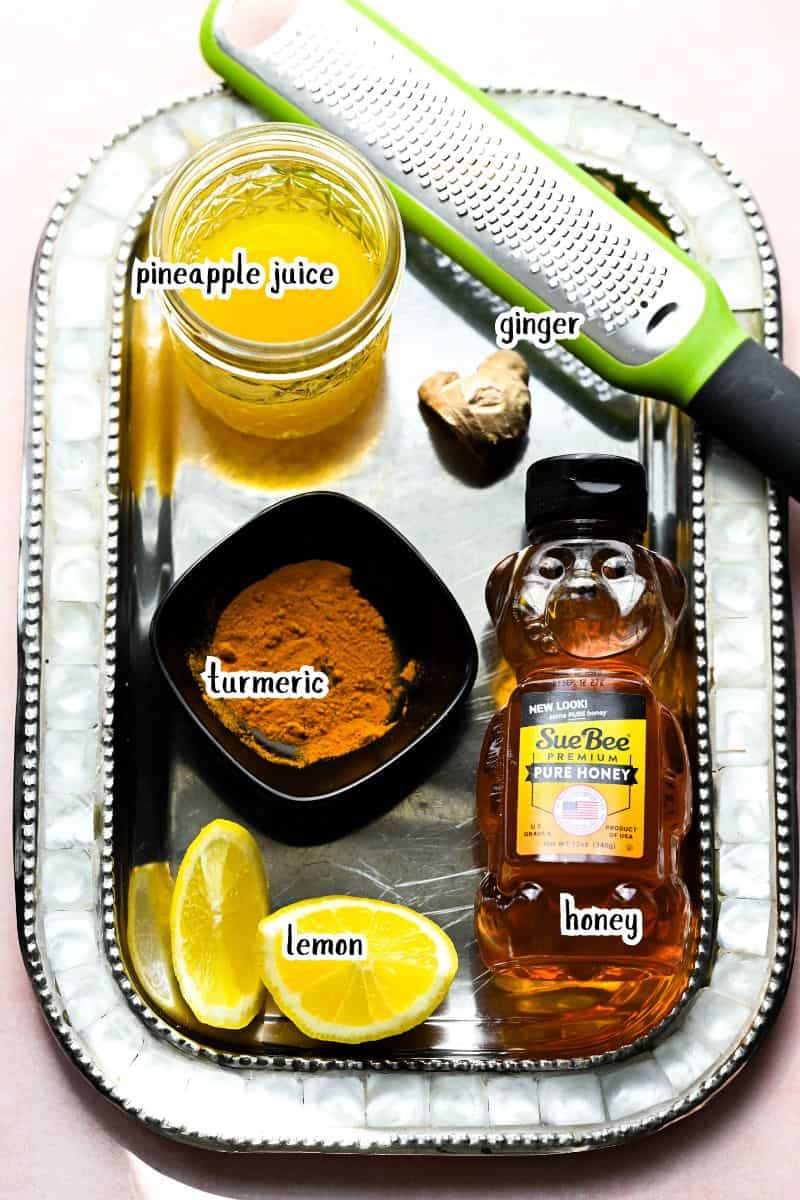 Pineapple mocktail ingredients on a plate. 