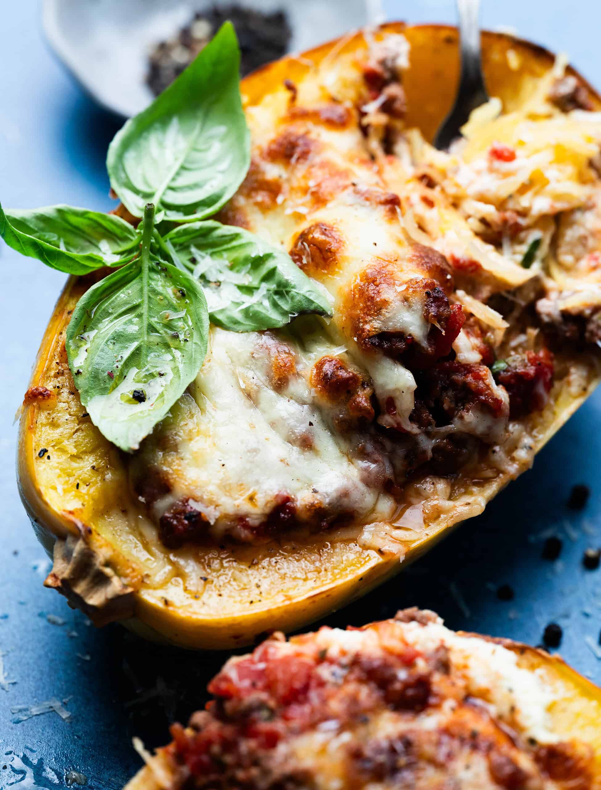 Freshly cooked spaghetti squash with basil garnish.