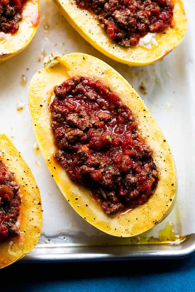Squash filled with meat sauce.