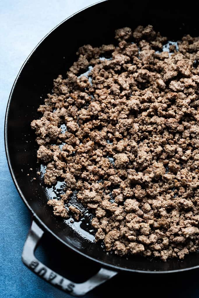 Ground beef in a pan.